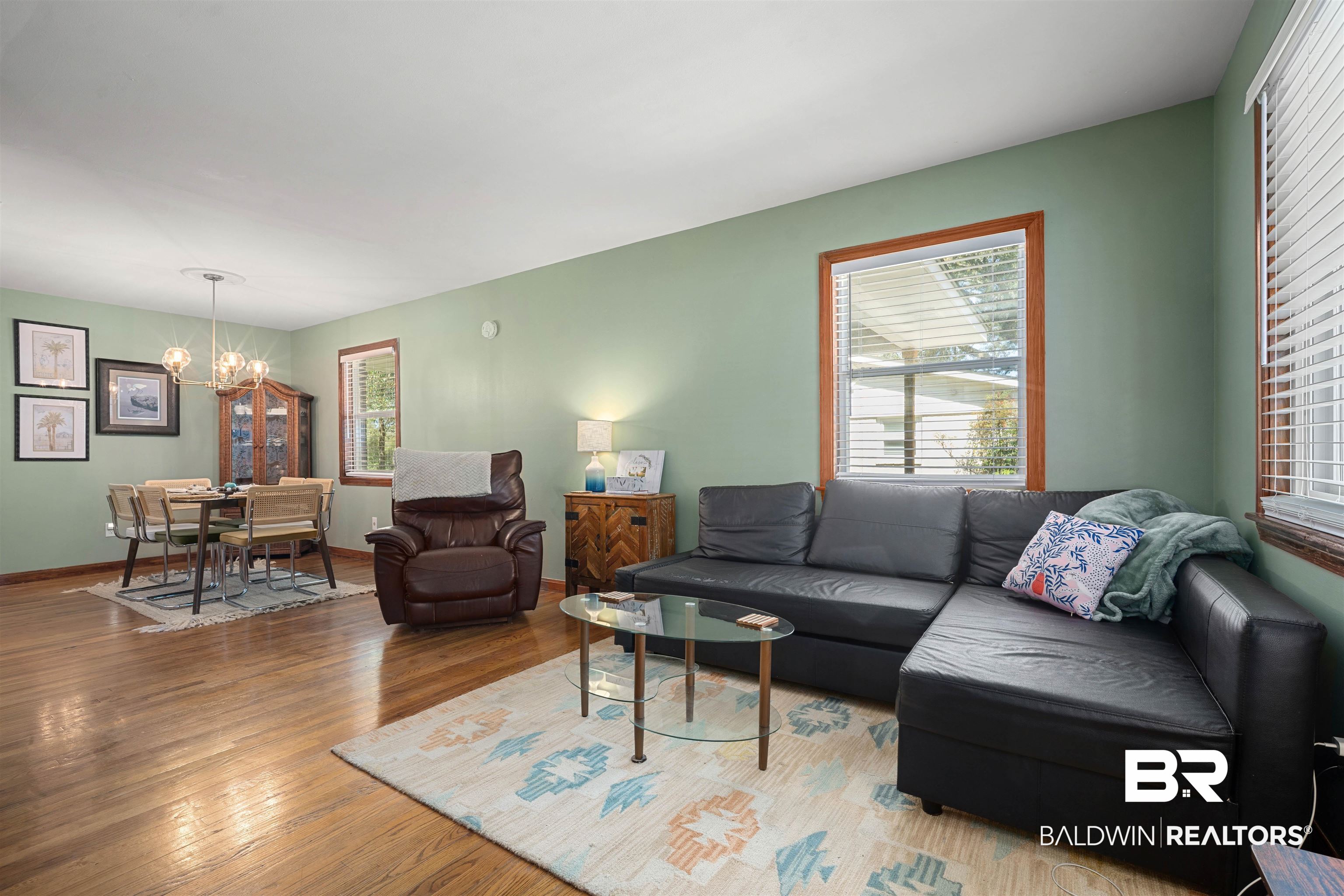 672 Tarawa Drive Mobile, AL 36609 - Photo 8 of 26 Living room with suspended lighting and wood-type flooring