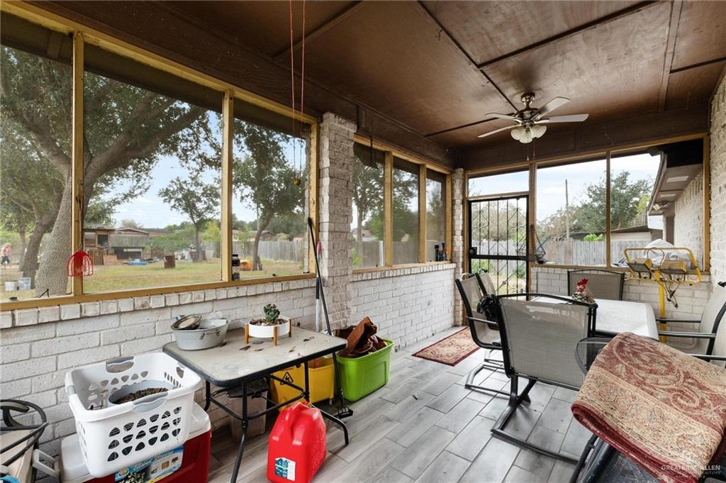 2101 Happy Street Mission, TX 78573 - Photo 13 of 20 a living room with furniture and a large window