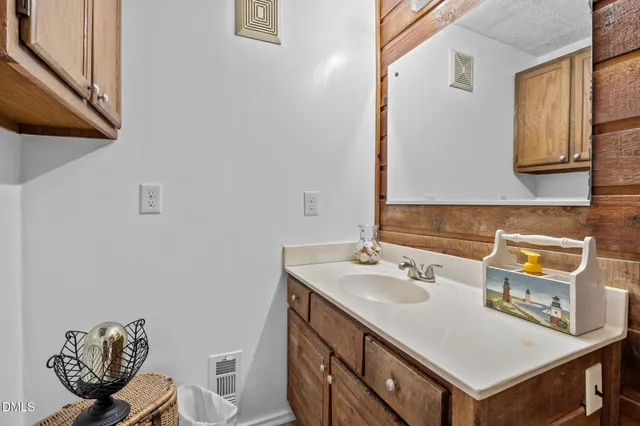 a view of a backyard with sitting area