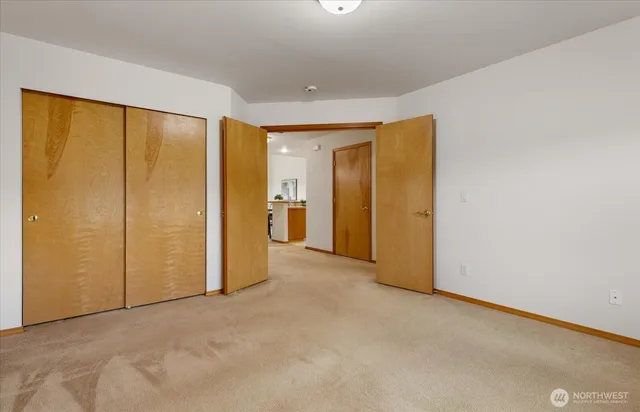 an empty room with a bathroom