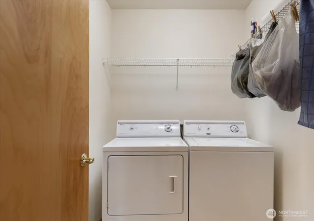 a utility room with dryer and washer
