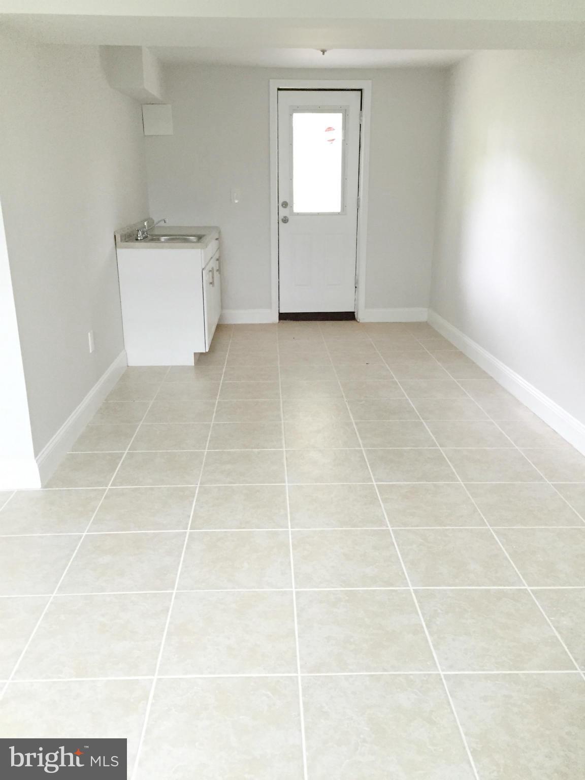 5705 Westgate Road Lanham, MD 20706 - Photo 21 of 26 a view of an empty room and window