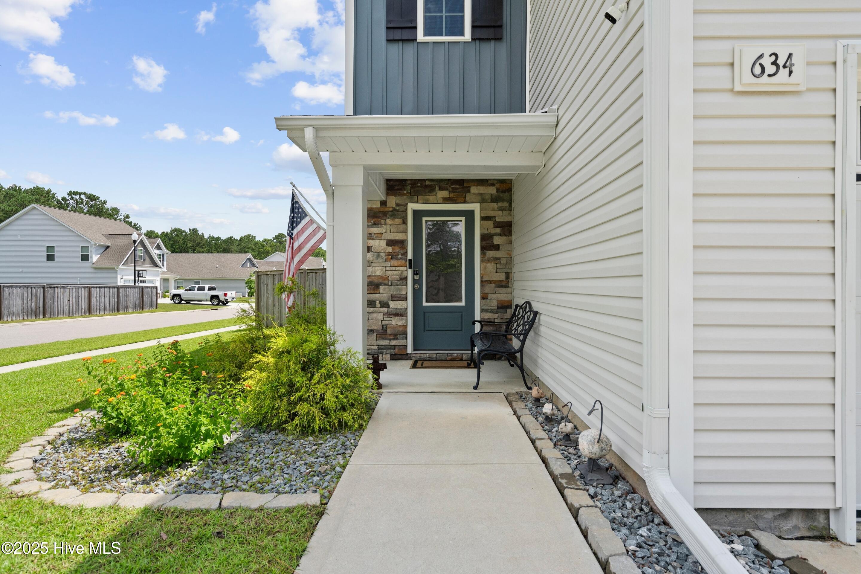 634 Aurora Place Hampstead, NC 28443 - Photo 2 of 51 Front Walk