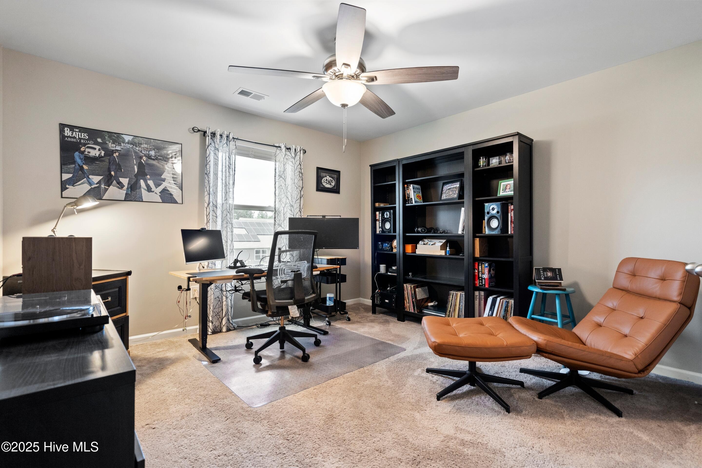 634 Aurora Place Hampstead, NC 28443 - Photo 32 of 51 3rd bedroom with ceiling fan