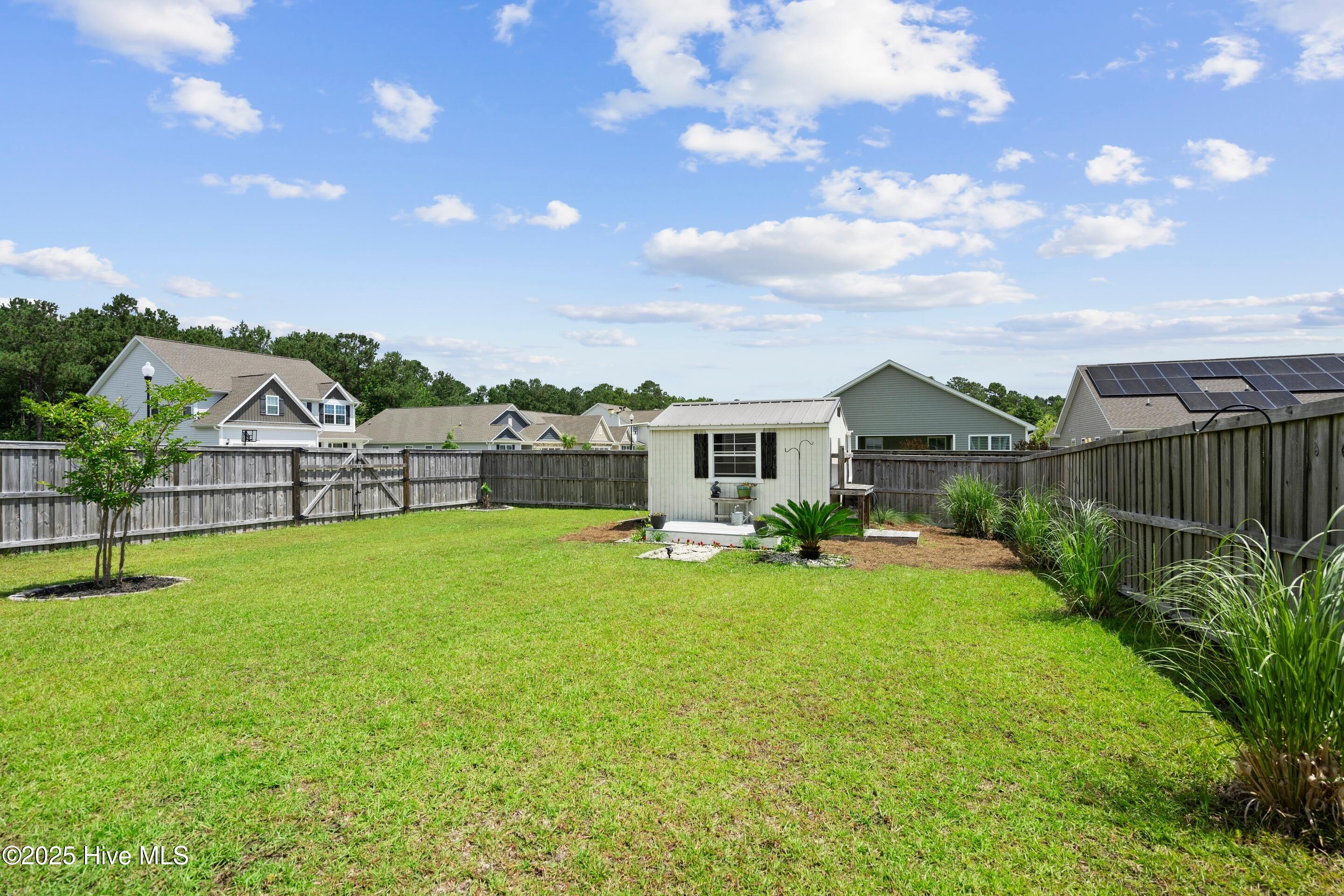 634 Aurora Place Hampstead, NC 28443 - Photo 36 of 51 Fence with double gate