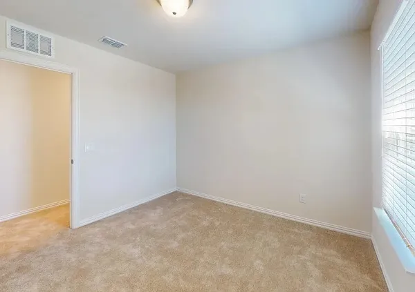 an empty room with a window