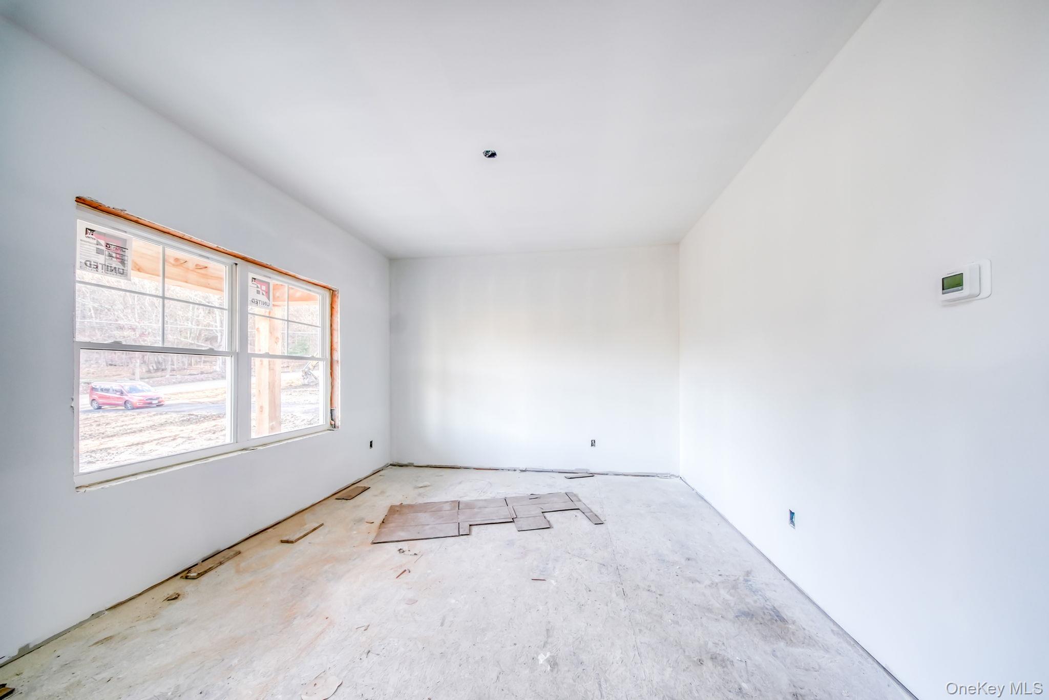 48 West Corbett Road Montgomery, NY 12549 - Photo 11 of 34 an empty room with windows