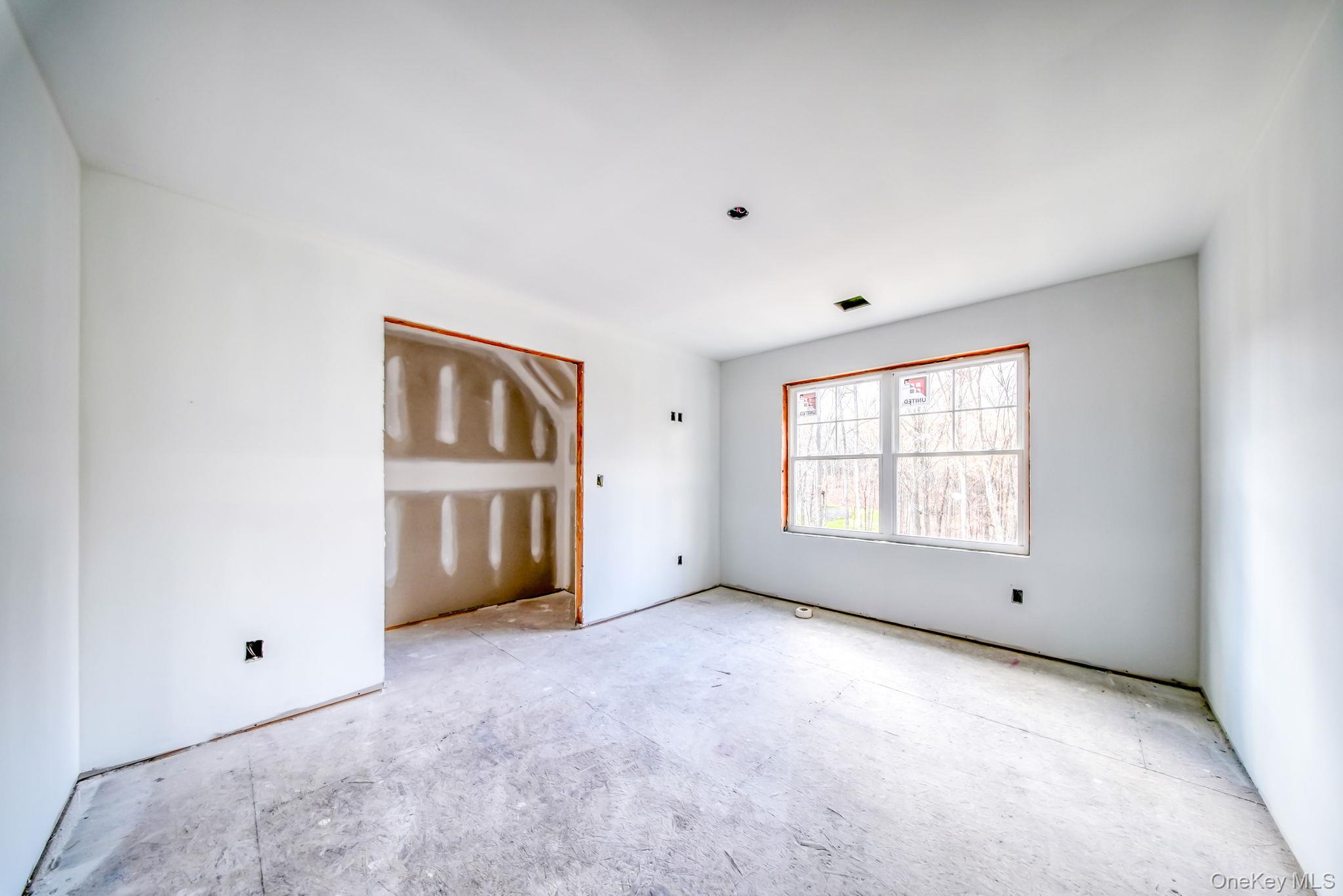 48 West Corbett Road Montgomery, NY 12549 - Photo 18 of 34 a view of an empty room with a window