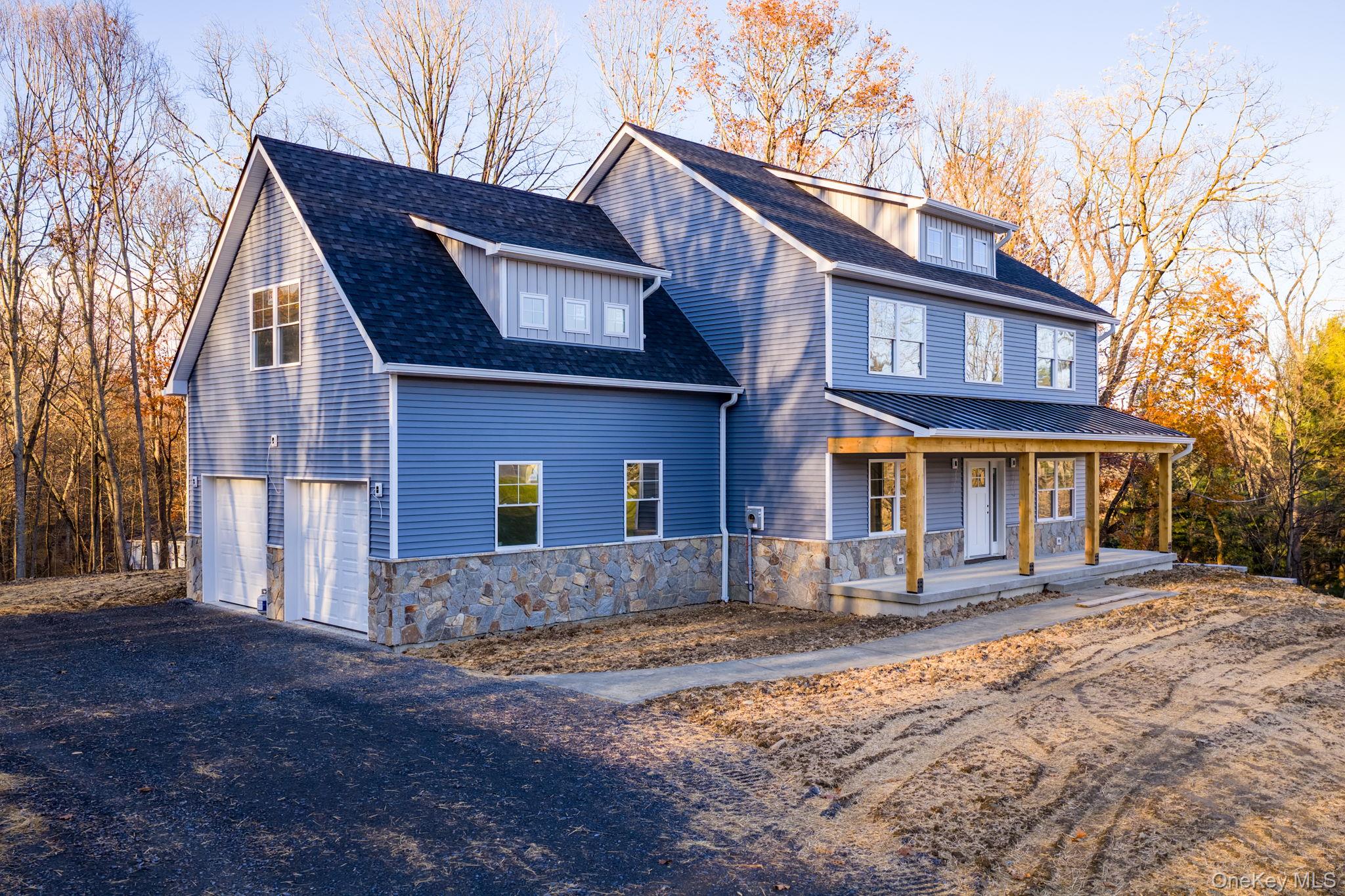 48 West Corbett Road Montgomery, NY 12549 - Photo 2 of 34 a front view of a house with a yard