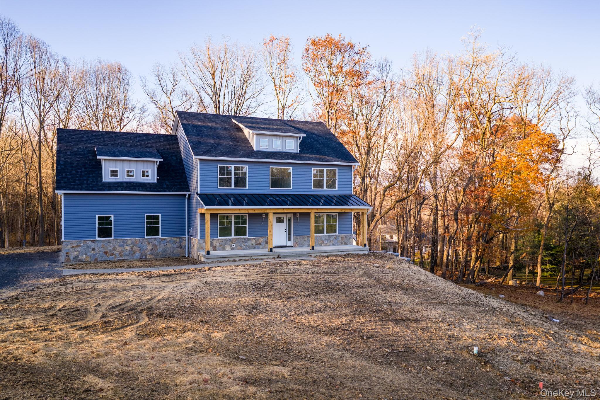 48 West Corbett Road Montgomery, NY 12549 - Photo 31 of 34 a front view of a house with a yard and tree s