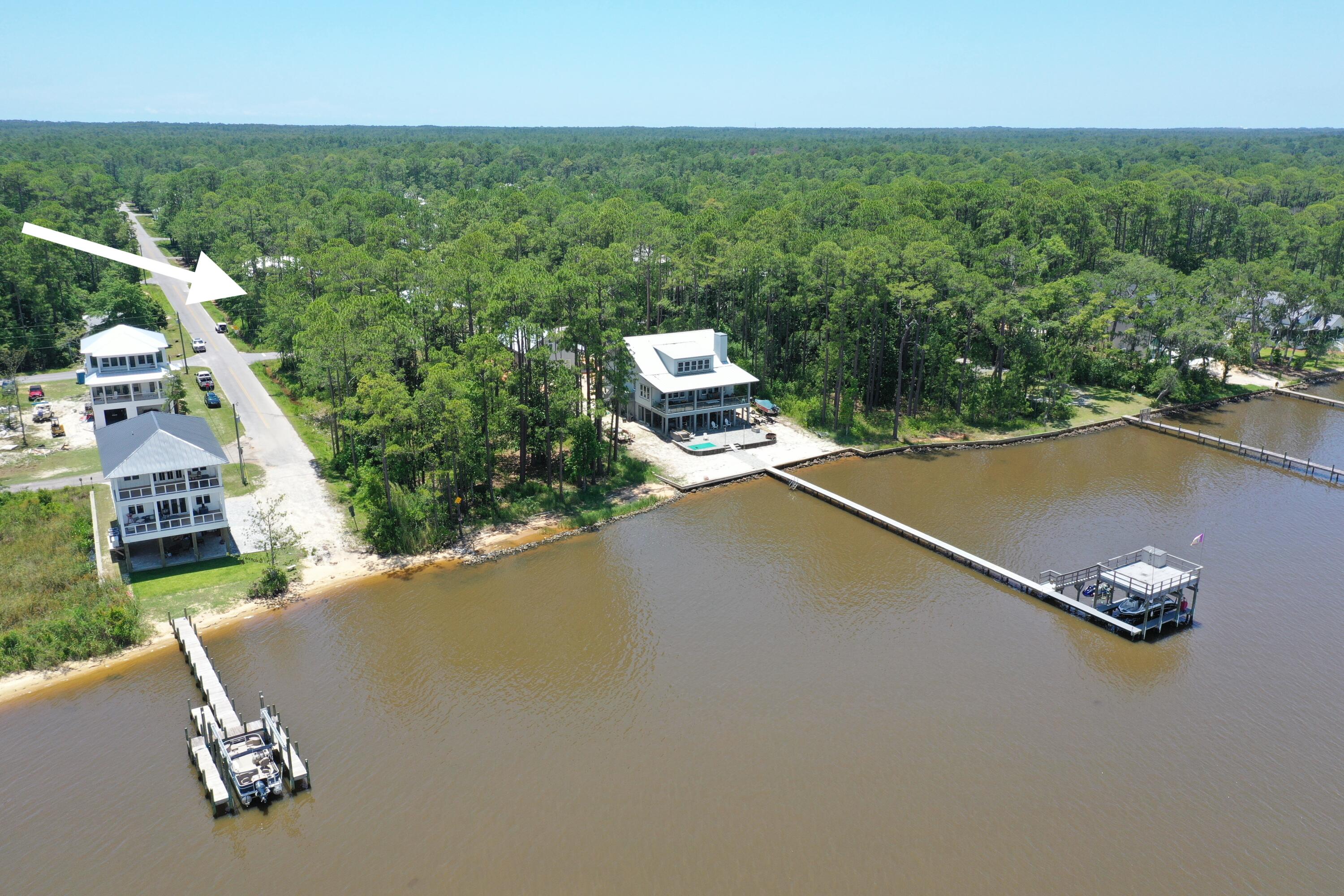 Lot 20 West Daisy Dr Point Santa Rosa Beach, FL 32459 - Photo 4 of 9 an aerial view of a house