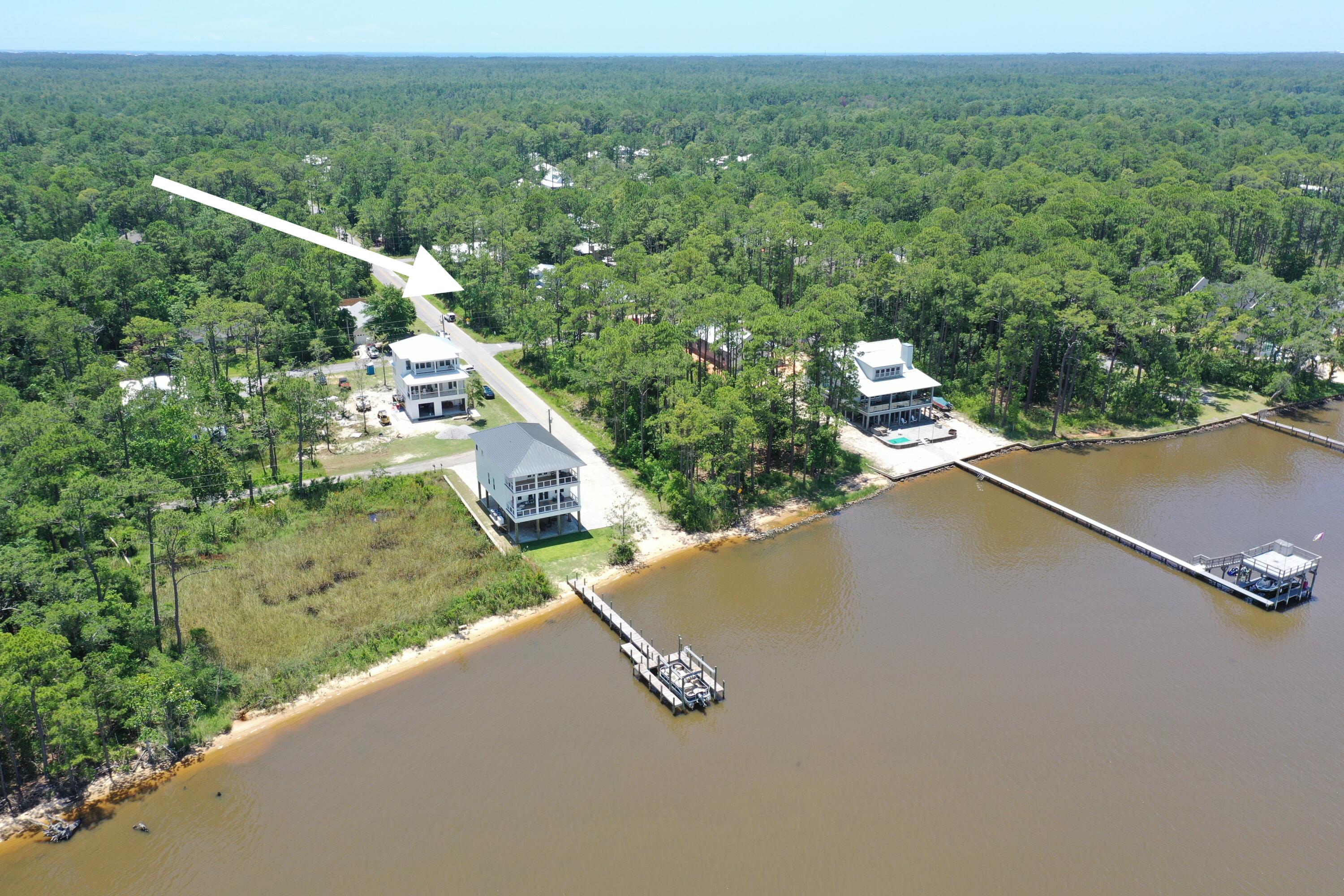 Lot 20 West Daisy Dr Point Santa Rosa Beach, FL 32459 - Photo 7 of 9 a view of a city street from a balcony