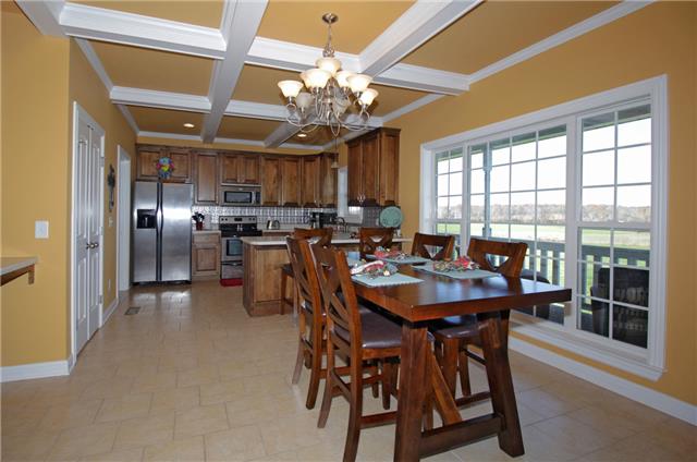259 Aplin Branch Road Cottontown, TN 37048 - Photo 5 of 19 a view of a dining room with furniture and chandelier