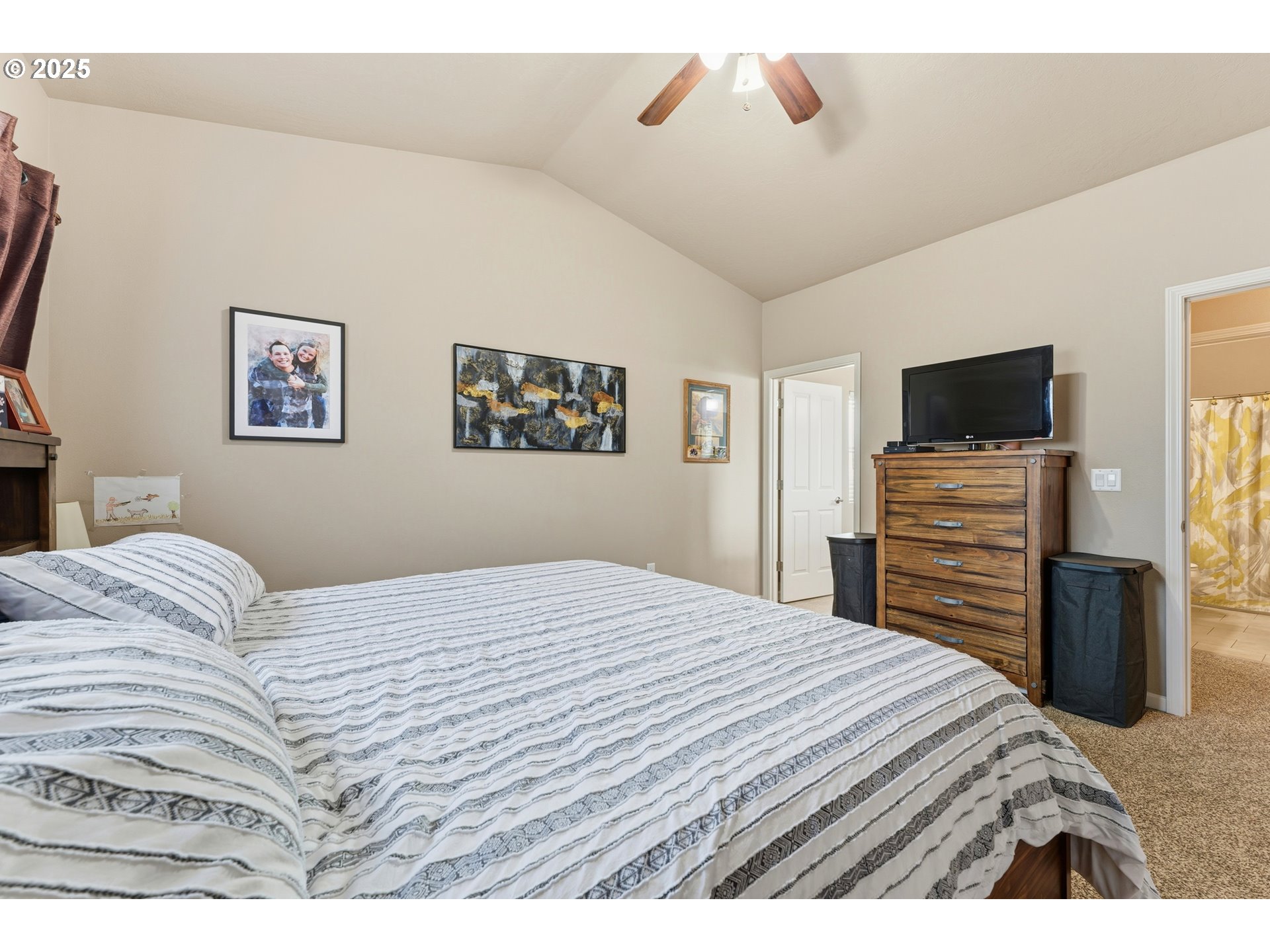 1914 Southwest 2nd Drive Pendleton, OR 97801 - Photo 20 of 35 a bedroom with a bed and a flat screen tv