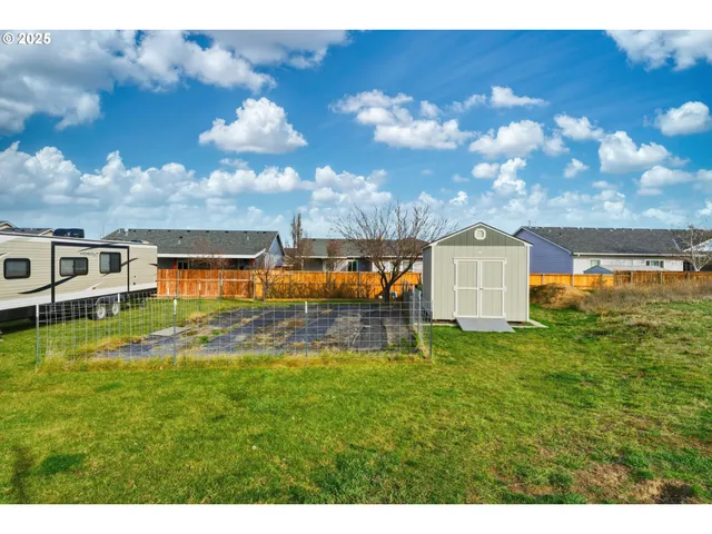 a view of a house with a big yard