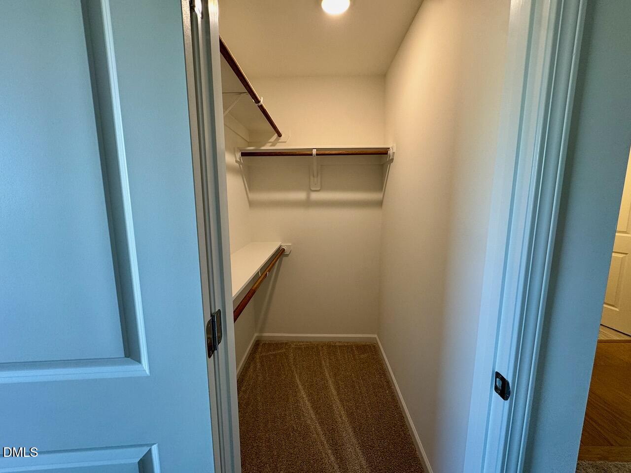 45 Covey Rise Way Lillington, NC 27546 - Photo 31 of 64 Owners Suite Walk-In-Closet 1