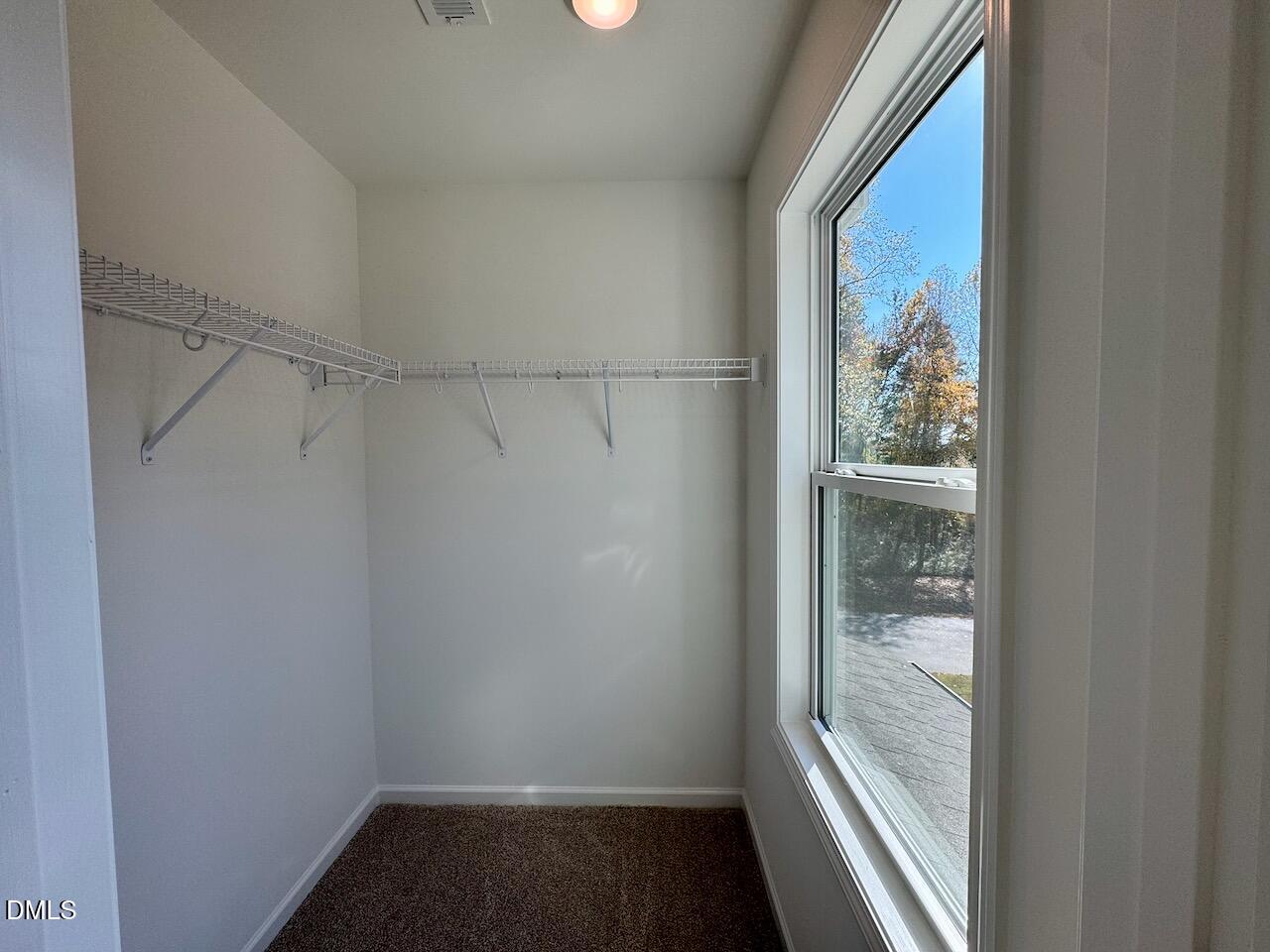 45 Covey Rise Way Lillington, NC 27546 - Photo 41 of 64 Bedroom 2 Walk-In-Closet