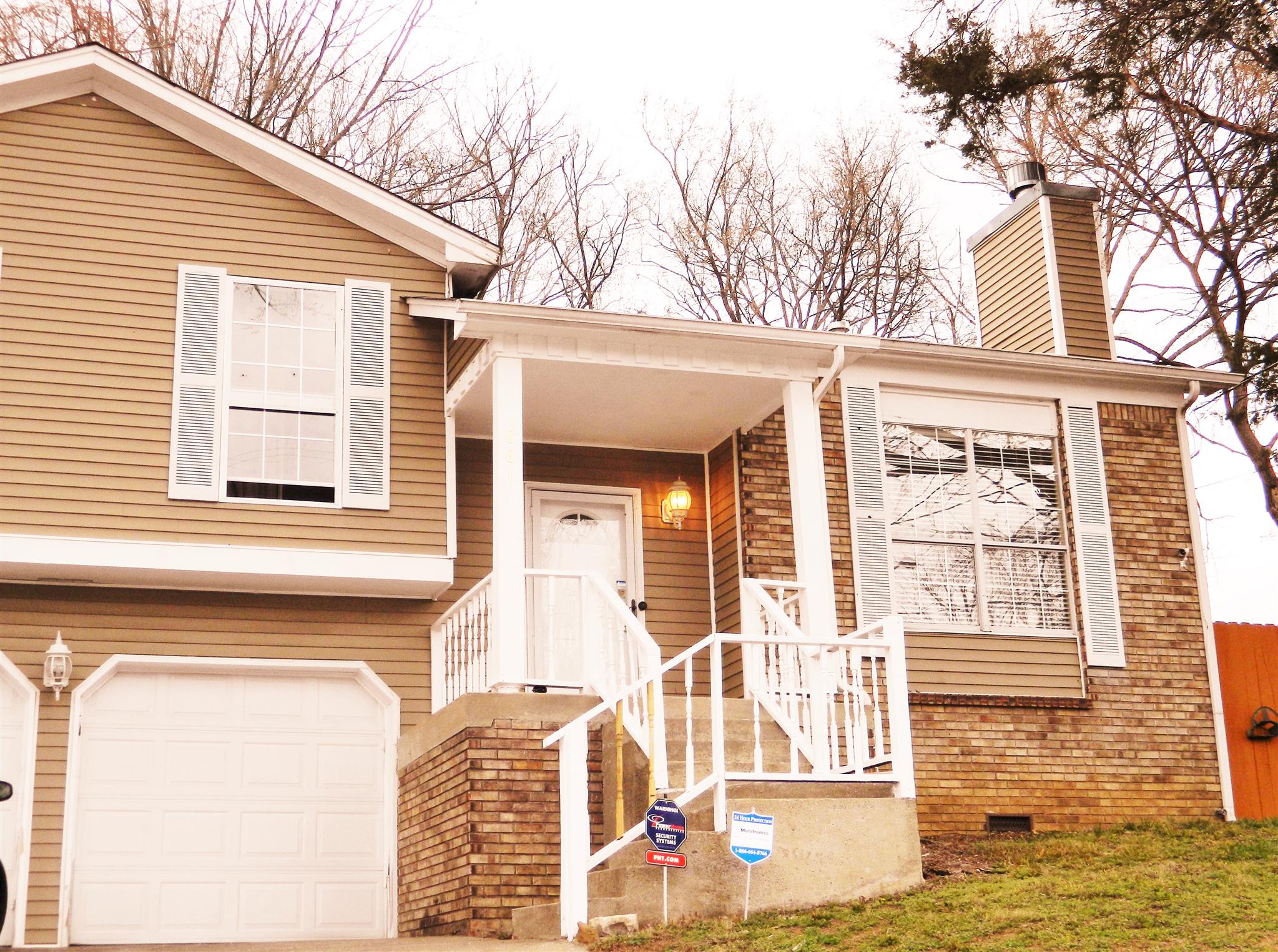 881 Bishopsgate Road Antioch, TN 37013 - Photo 17 of 19 a front view of a house with a ocean view
