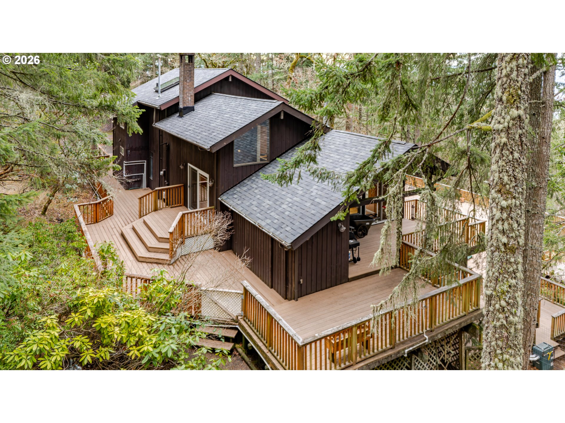 a balcony with table and chairs