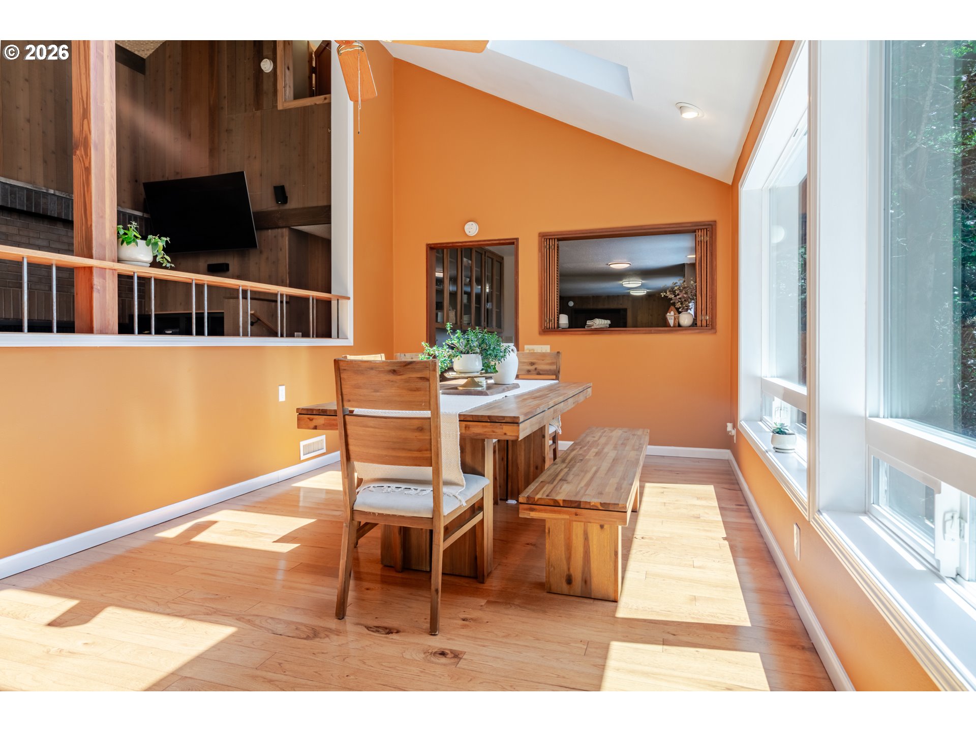 1622 Northwest Ribier Place Corvallis, OR 97330 - Photo 12 of 48 a dining room with furniture and a flat screen tv