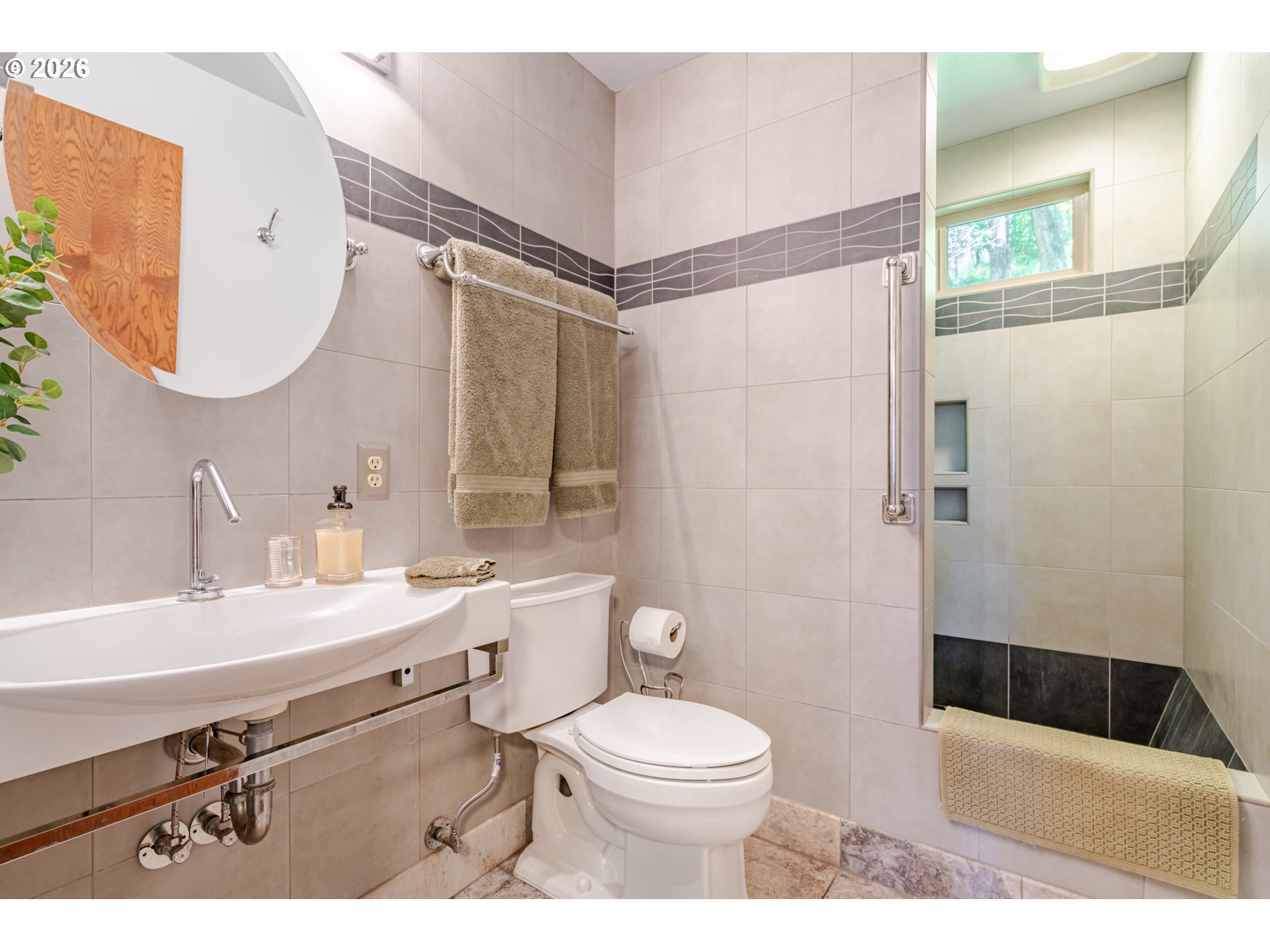 1622 Northwest Ribier Place Corvallis, OR 97330 - Photo 21 of 48 a bathroom with a sink a toilet a mirror a vanity and shower