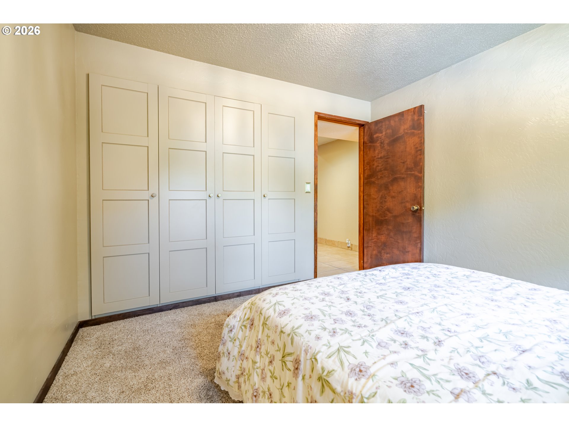 1622 Northwest Ribier Place Corvallis, OR 97330 - Photo 29 of 48 a view of a bedroom with wooden floor and bathroom