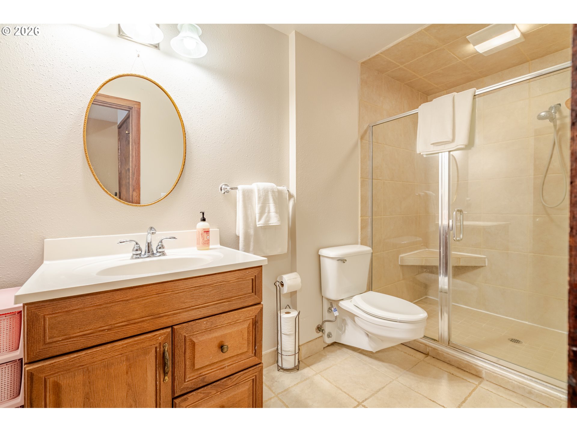 1622 Northwest Ribier Place Corvallis, OR 97330 - Photo 31 of 48 a bathroom with a sink a toilet and a mirror
