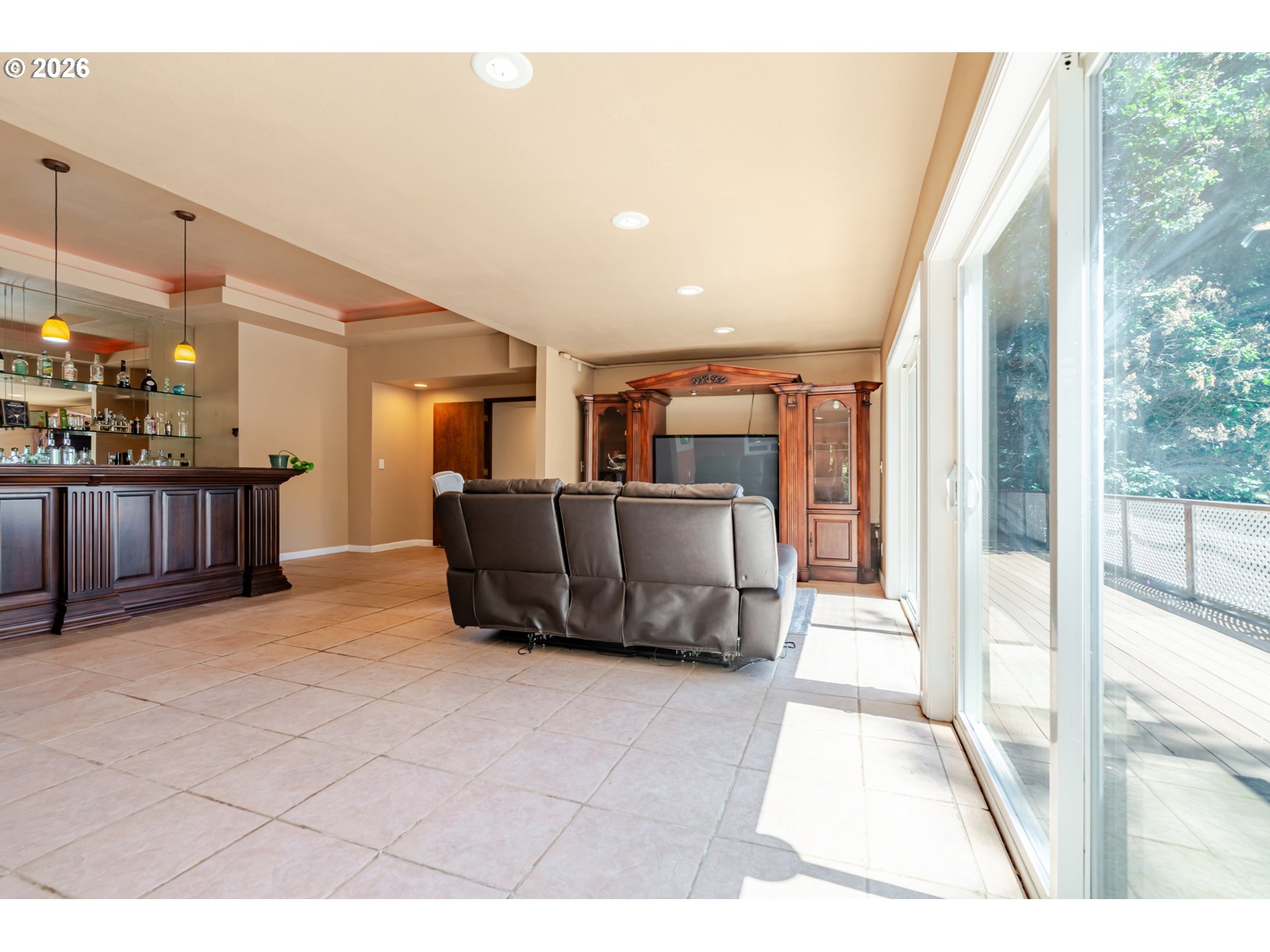 1622 Northwest Ribier Place Corvallis, OR 97330 - Photo 35 of 48 a living room with furniture a kitchen view and a fireplace