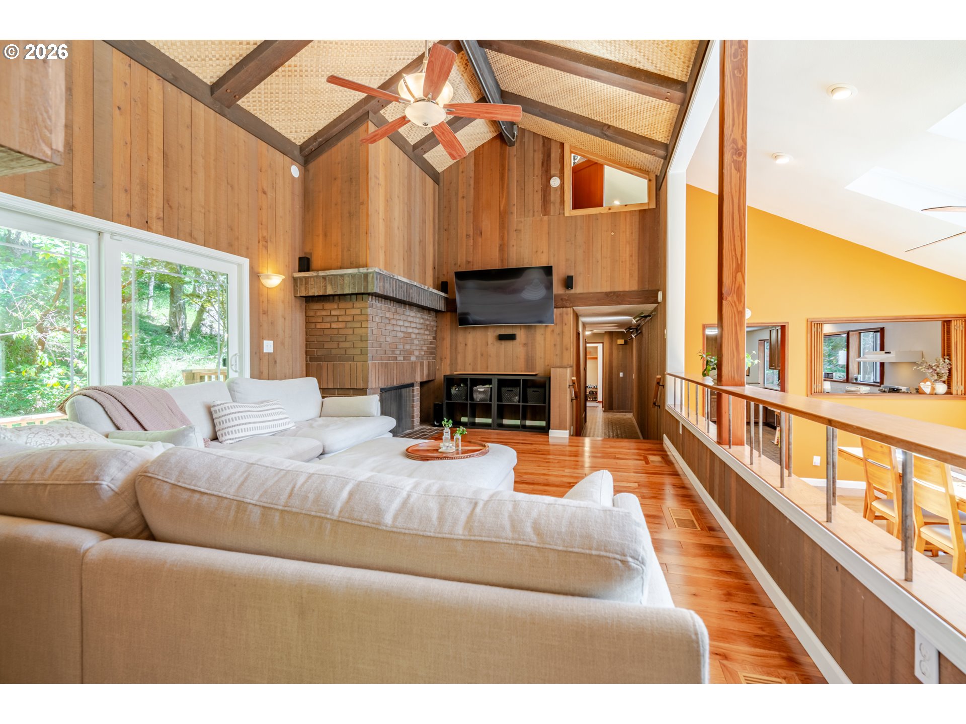 1622 Northwest Ribier Place Corvallis, OR 97330 - Photo 7 of 48 a living room with furniture a large window and a fireplace