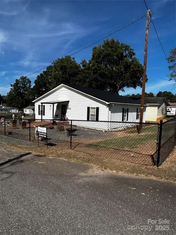 a house view with a garden space
