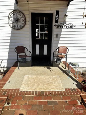 a view of a bench in the patio