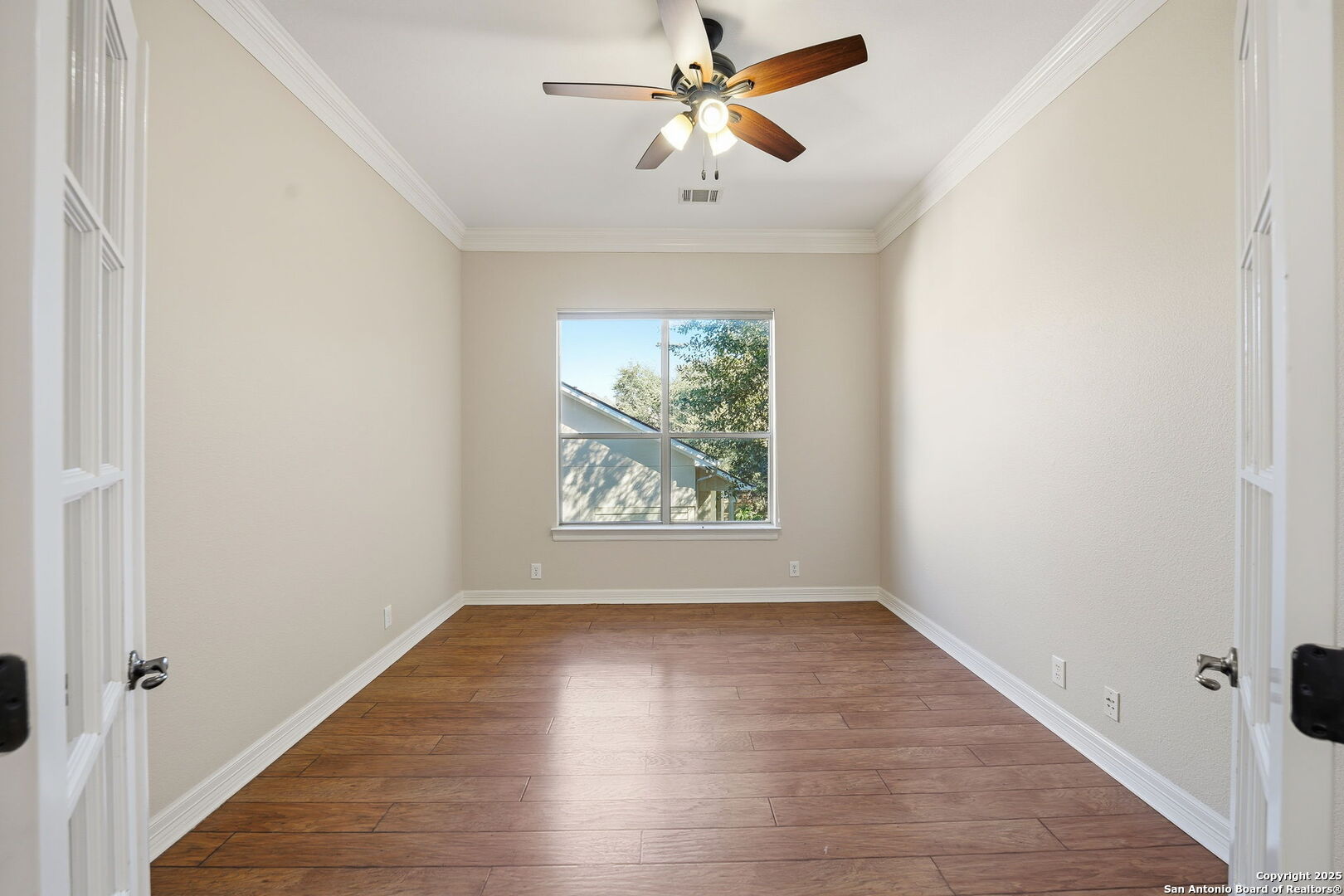 410 Heather Ridge San Antonio, TX 78260 - Photo 18 of 43 a view of room with window and ceiling fan