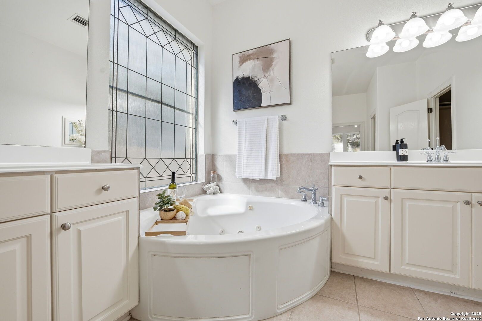 410 Heather Ridge San Antonio, TX 78260 - Photo 26 of 43 a bathroom with a sink and a mirror