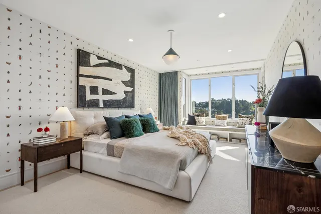 a reading room with furniture and a window