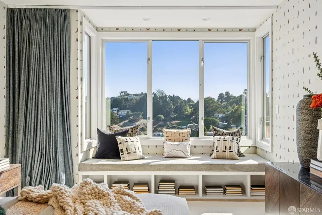 a view of a hallway view with living room and furniture