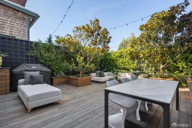 a view of a patio in the backyard