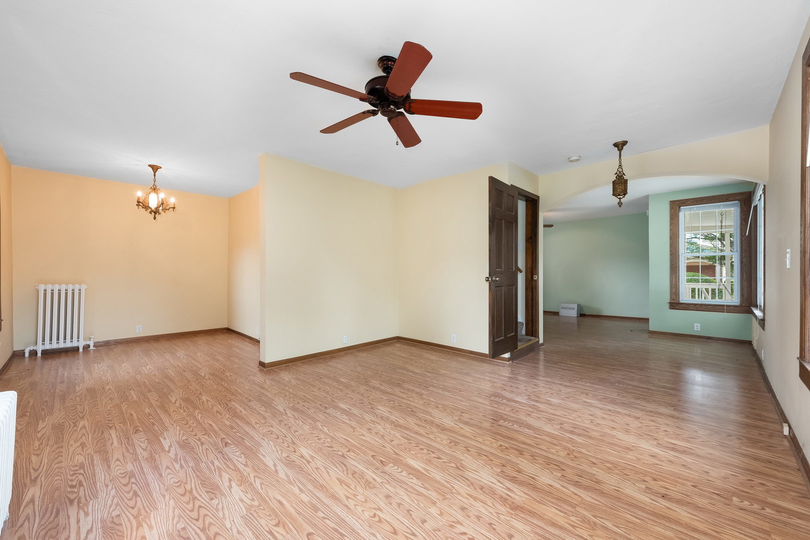 318 West Wing Street Arlington Heights, IL 60005 - Photo 5 of 16 an empty room with wooden floor and windows