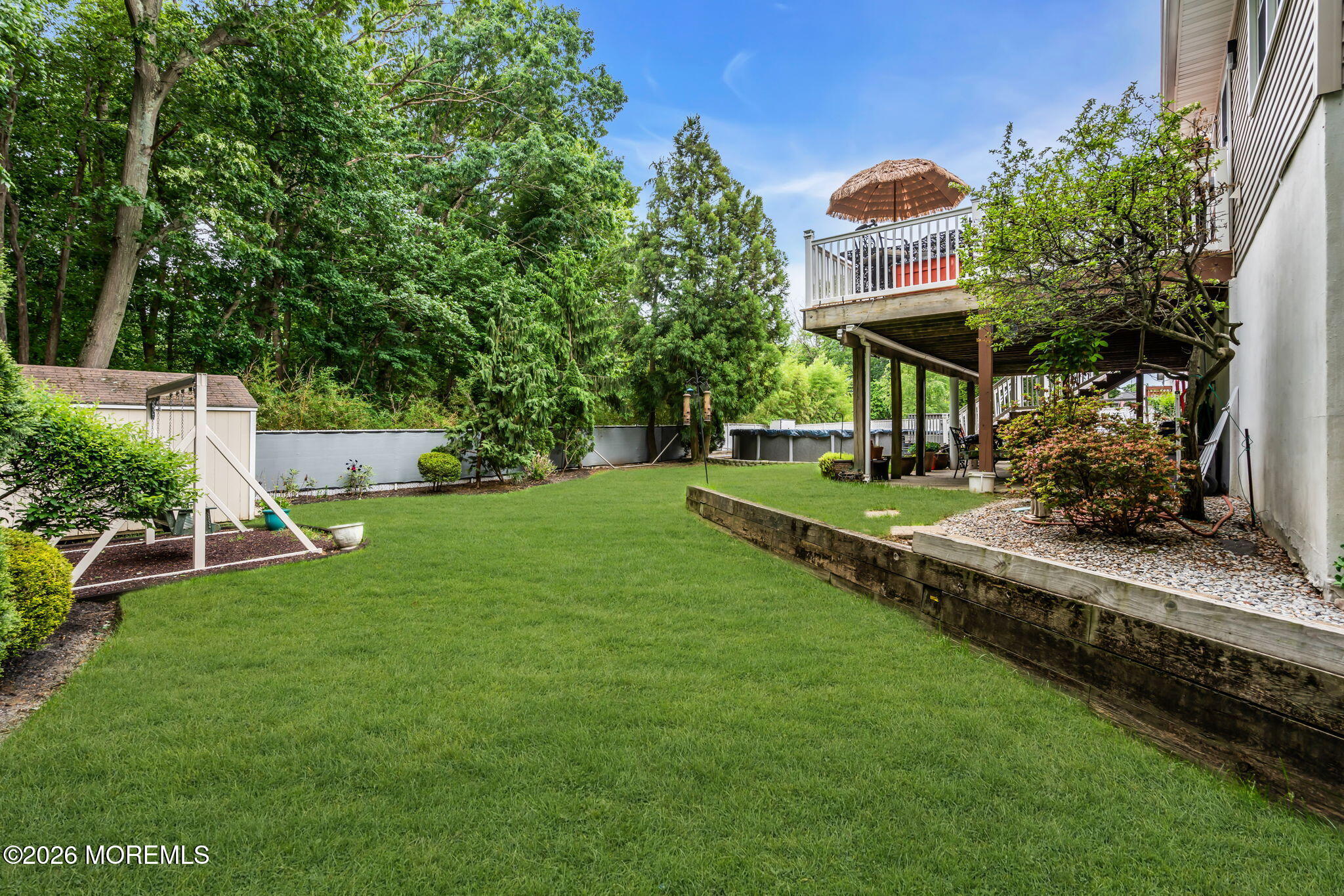 21 Ryan Road Marlboro, NJ 07746 - Photo 45 of 56 a view of a house with a backyard