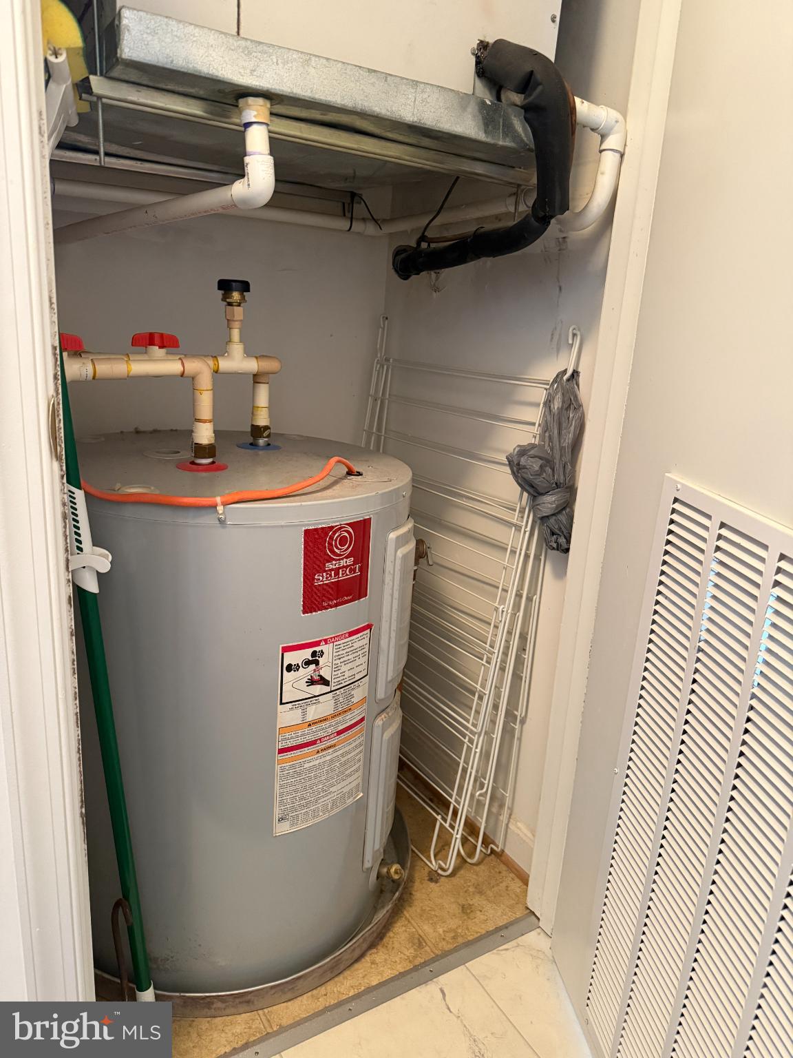 5000 Call Place Southeast, Unit 303 Washington, DC 20019 - Photo 15 of 16 Utility space with water heater installation.