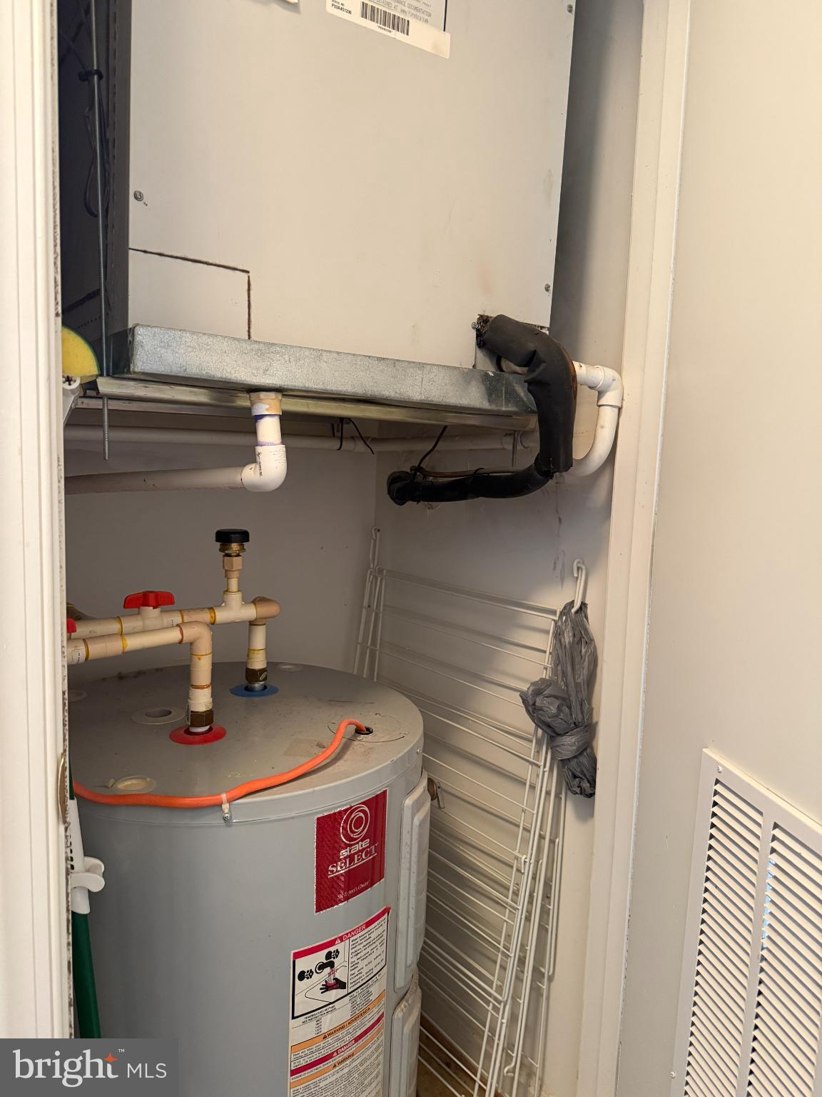 5000 Call Place Southeast, Unit 303 Washington, DC 20019 - Photo 16 of 16 Utility closet with essential appliances.