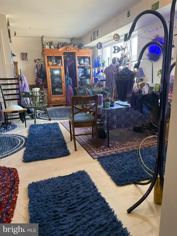 a living room with lots of furniture