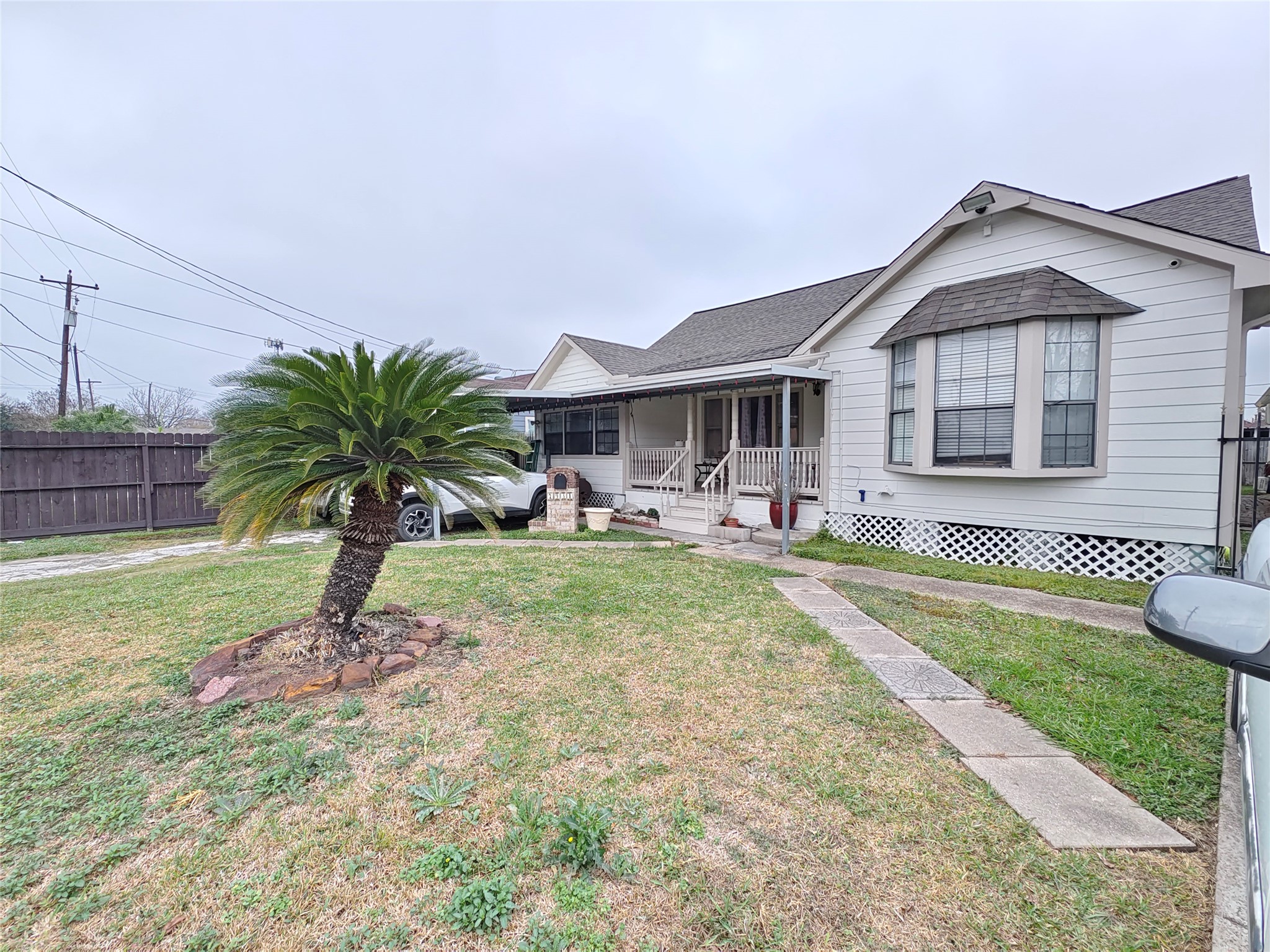 7931 Scanlock Street Houston, TX 77012 - Photo 2 of 28 a view of a house with a yard patio and swimming pool