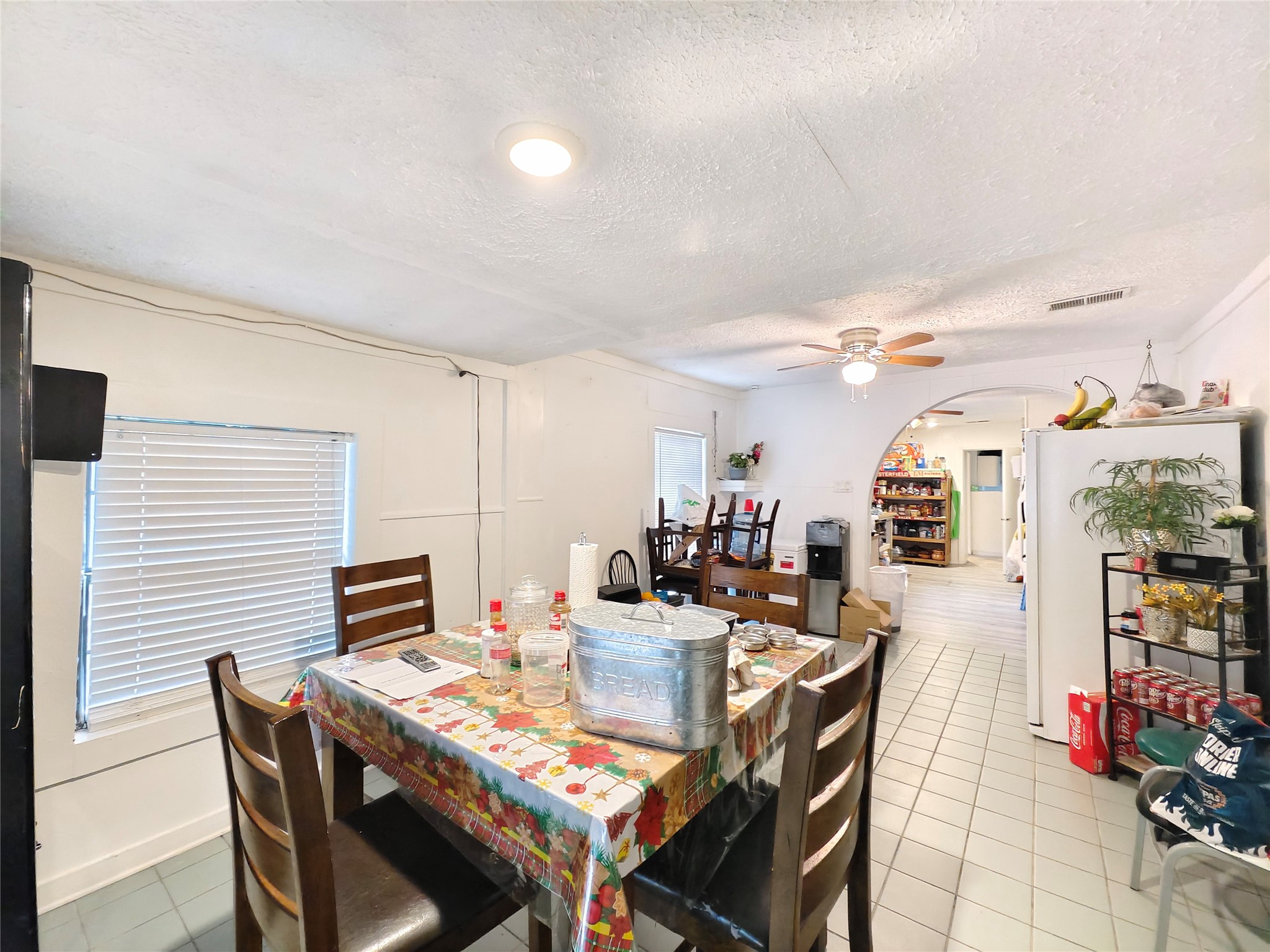 7931 Scanlock Street Houston, TX 77012 - Photo 10 of 28 a view of a dining room with furniture