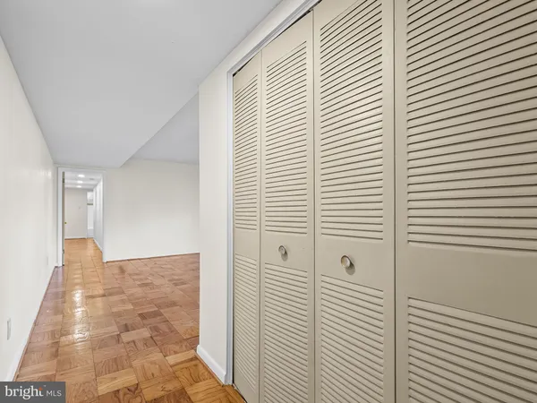 a view of a hallway with windows
