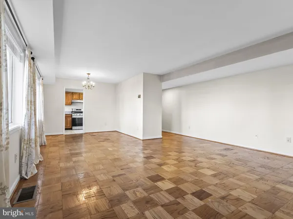 a view of an empty room and window