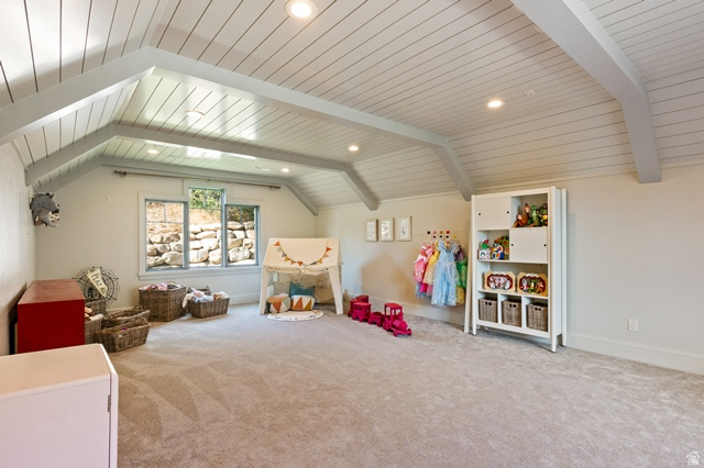 3 Carriagewood Cove, Unit 1088 Sandy, UT 84092 - Photo 44 of 79 Spacious room featuring a vaulted ceiling with exposed beams, recessed lighting, and light-colored carpeting