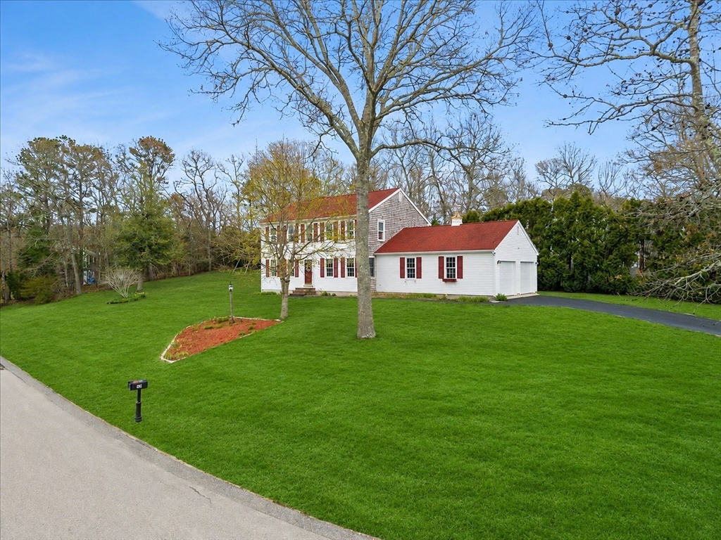34 Windsor Way Mashpee, MA 02649 - Photo 2 of 42 a view of a house with a yard