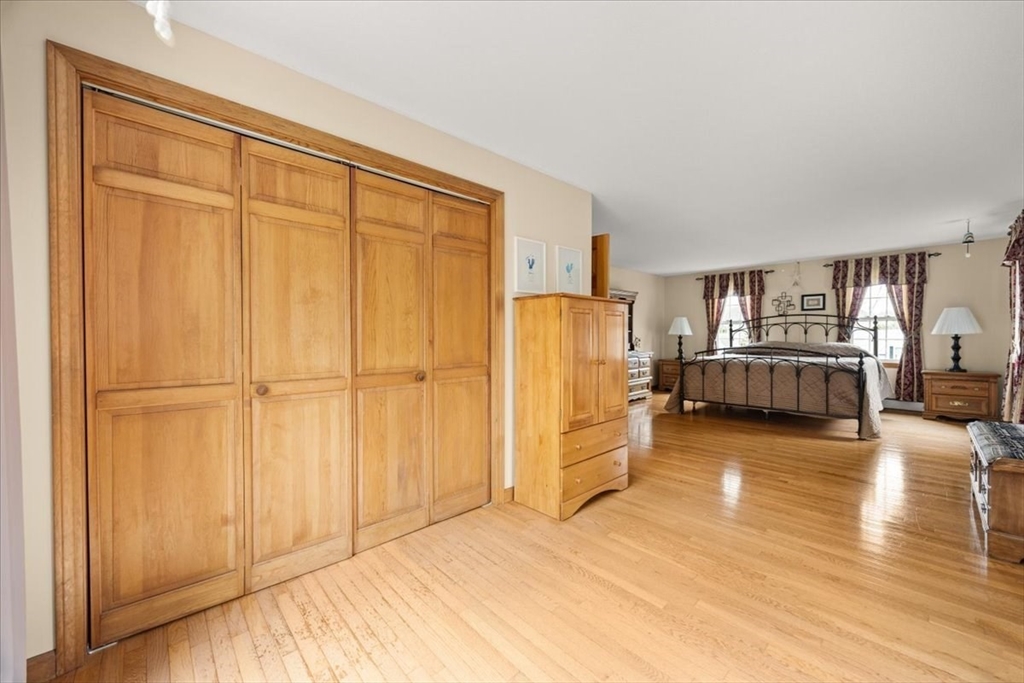 34 Windsor Way Mashpee, MA 02649 - Photo 29 of 42 a view of a livingroom with furniture wooden floor and cabinet