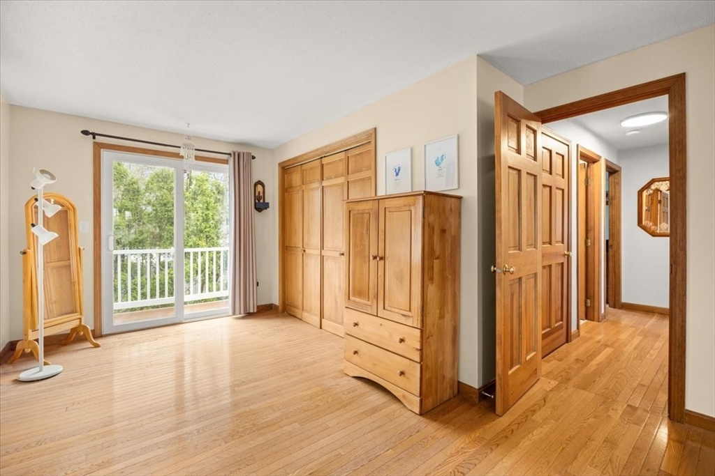 34 Windsor Way Mashpee, MA 02649 - Photo 30 of 42 a view of a room with wooden floor and windows