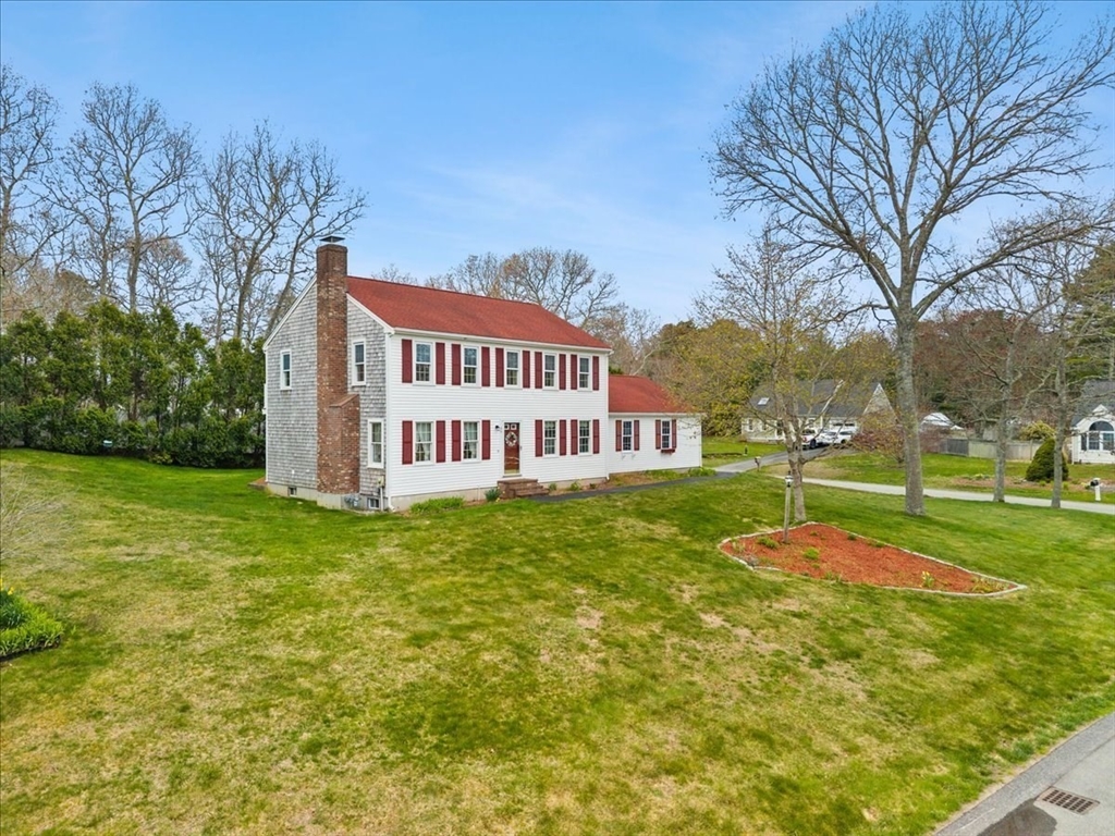 34 Windsor Way Mashpee, MA 02649 - Photo 3 of 42 a view of a house with a yard